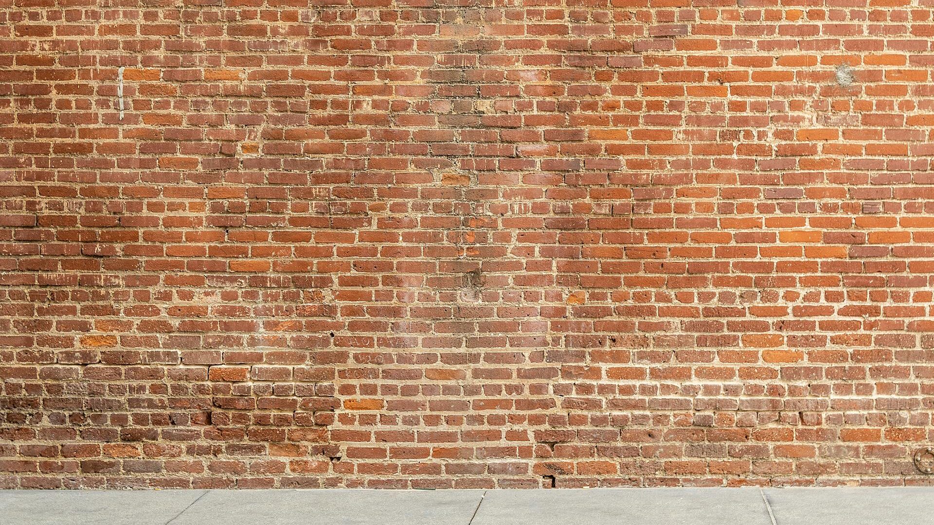 a brick wall signifying the segmentation of audiences